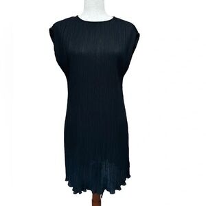 Madewell black plisse black mini sheath dress.
